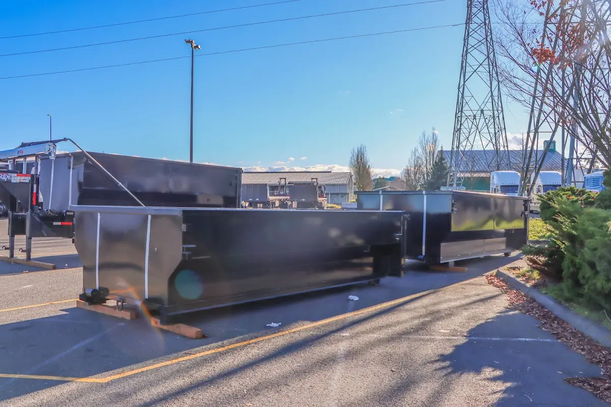 Roll-off dumpster ready for waste disposal at job site for 2 Yard Dumpster Rental in Riviera Beach